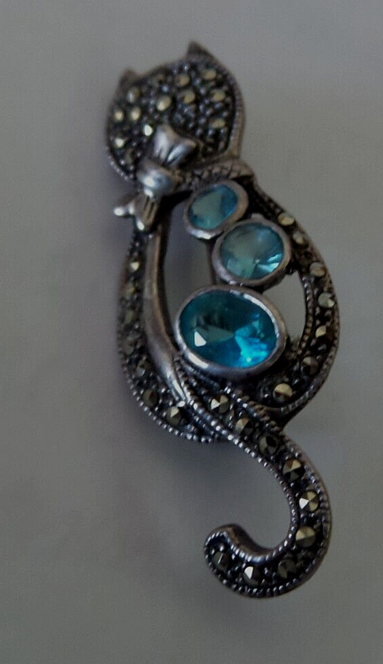 Sterling Markasite Cat brooch with Three Blue Topaz stones
