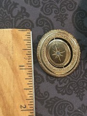 Vintage 1970s Avon Spinner Brooch Gold Tone Rotating Starburst Rhinestone Signed