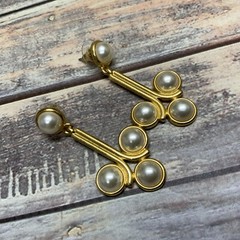 Pierced faux pearl cabochon dangle earrings in gold tone metal