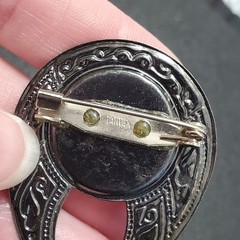 Dark silver tone rhinestone teardrop shaped brooch