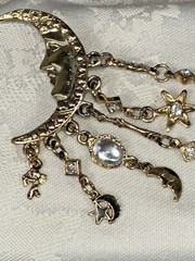 Gold Tone Crescent Moon With Dangling Stars, Cupid, Moon, Rhinestones Brooch