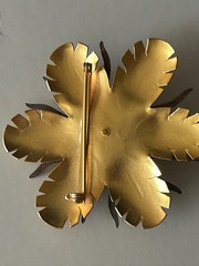 Vintage Jonette Jewelry flower brooch, two-tone metal petals a central cabochon