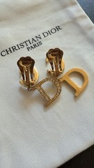 Authentic Christian Dior monogram logo clip-on earrings from the 1990s – Gold