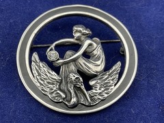 art nouveau style sterling silver pin woman and bird 1 5/8” diaameter