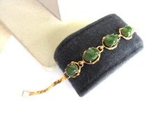 Vintage gold tone herringbone chain with 4 faux jade cab stones bracelet