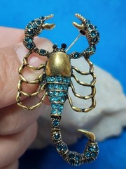 Vintage-Inspired Gold Scorpion Brooch with Teal Rhinestones