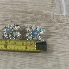 Vintage Judy Lee rhinestone and blue aurora borealis moon glow clip on earrings