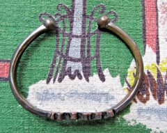 Vintage 2000’s Lucky Brand Peace steel bracelet