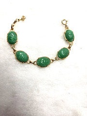 Vtg gold tone green lucite carved Scarab Bracelet