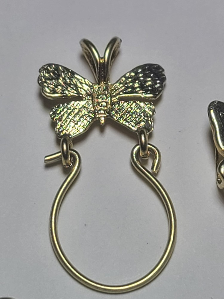 5.50 14K SOLID YELLOW GOLD, 6 14K Charms and one heavy charm holder