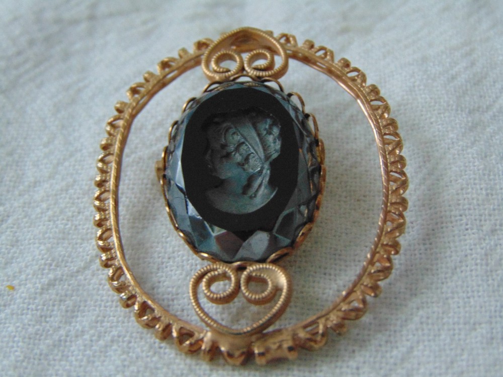 vintage antique gold plated cut out carved hematite intaglio cameo brooch
