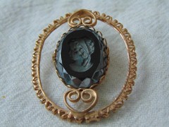 vintage antique gold plated cut out carved hematite intaglio cameo brooch