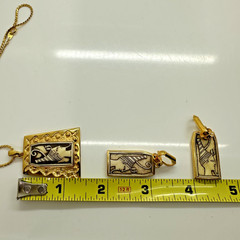 SET OF VINTAGE CELEBRITY GOLD TONE EGYPTIAN MOTIF PENDANT NECKLACE & EARRINGS
