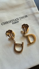 Authentic Christian Dior monogram logo clip-on earrings from the 1990s – Gold