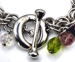Vintage silvertone & glass charm bracelet with rare car, gold card, cell phone