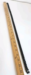 Black faceted beaded necklace. Long! 26″ long.