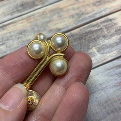 Pierced faux pearl cabochon dangle earrings in gold tone metal