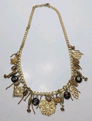 ✨VINTAGE✨ 16″ Ornate Gold Tone Dangling Necklace w/ Charms, Stones & Beads