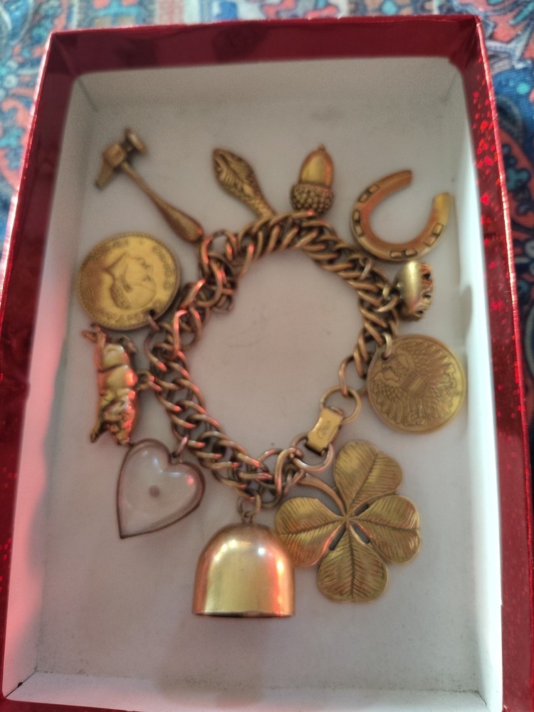 1950’s Charm Bracelet 11 Charm Heavy Gold Tone Good Condition