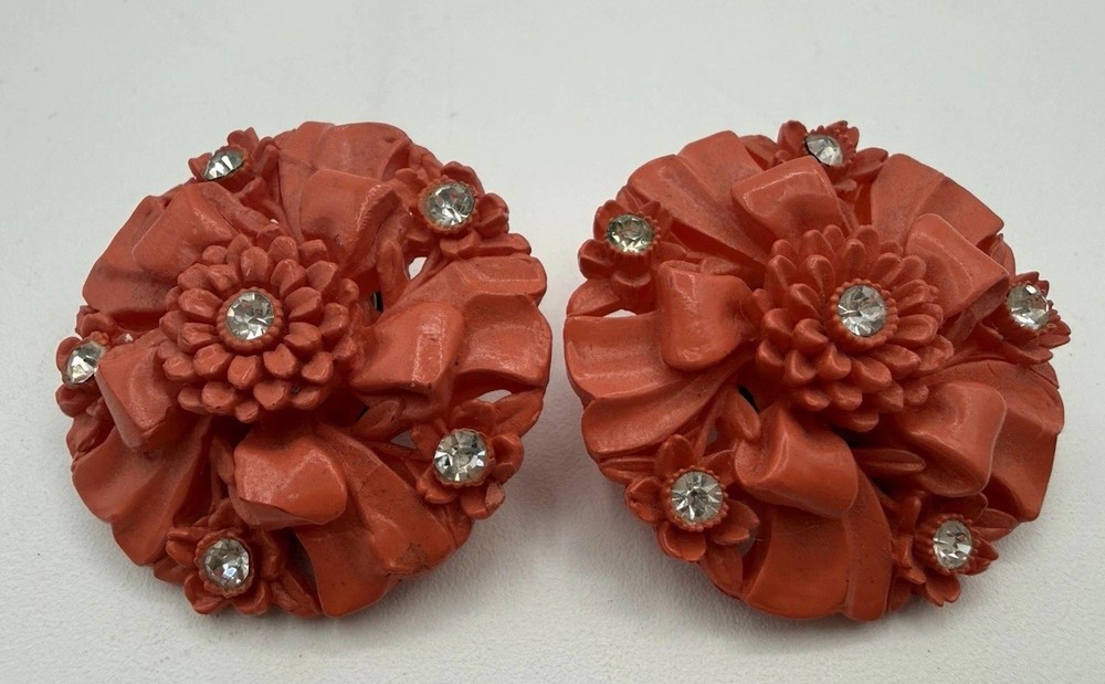 Vintage Carved Celluloid Rhinestone Clip On Earrings Floral Bow Coral Color