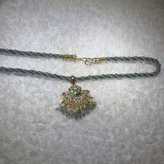 Vintage Indian Style, Gold, Toned Pendant necklace, Twisted Teal Silk Dori Cord