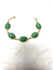 Vtg gold tone green lucite carved Scarab Bracelet