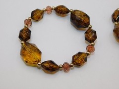 J175-LOT OF 4 STRETCH BRACELETS~AMBER/GOLD TONE BEADS~HARD PLASTIC~