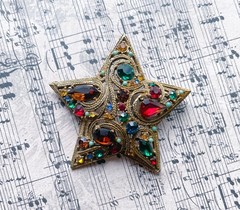 Vintage La Roca Gold Alloy Multicolor Rhinestone Star Brooch