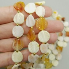 Vintage Long Single Strand Orange and Cream Beaded Necklace Plastic Leaf Shapes