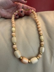 1980s Napier Pale Orange and Cream Lucite with Gold spacers Necklace.