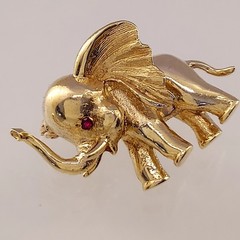 Vintage 14k Elephant Brooch with Red Eyes. High Polish and Textured. 4.8 Grams.