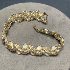 Vintage Coro 7.5” Bracelet Textured Gold Tone Leafs Rhinestones Fold Over Clasp