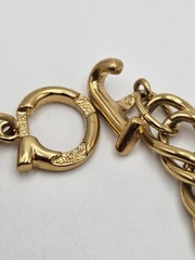 Vintage Jackie Collins Gold Tone Enamel Lady Boss Charm Bracelet Toggle Clasp