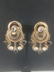 Signed CRAFT Goldtone intertwined circles black clear stones dangle earrings