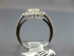 ESTATE .99CT DIAMOND 14KT WHITE GOLD 3D ROUND & PRINCESS HALO ENGAGEMENT RING