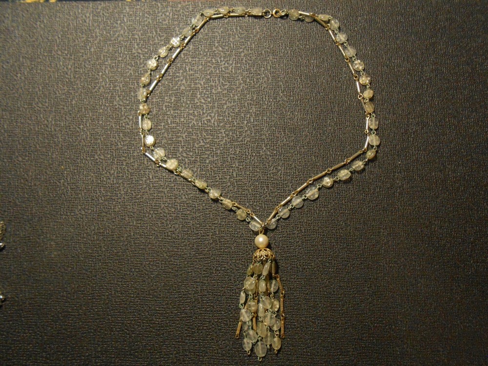 vintage necklace and clip and screw-on earrings of various colors