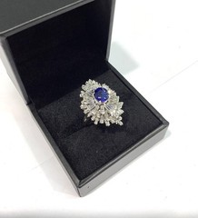 18K White Gold 5.90ctw Oval Blue Sapphire & Tapered Baguette Diamond Ring