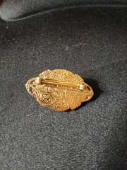 White Cream Colored Lucite Brooch with Red Glass Cabachon in Goldtone Filligree