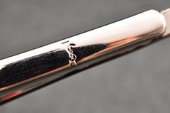 Near mint, gold and Cufflinks and silver tie clip, “Yves Saint Laurent”, case.