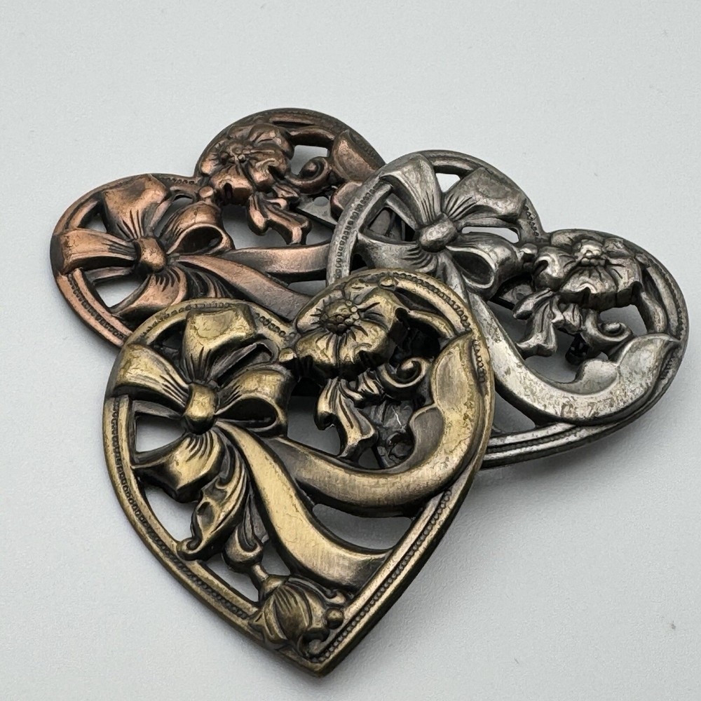 K&T Signed Triple Heart Tiered Goldtone Silvertone Copper Colored Brooch Pin