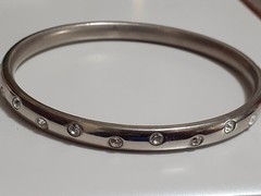 Crystal polka dot bangle bracelet Silvertone flush set stones eternity band