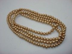 VINTAGE “Andrea” CHAMPAGNE FAUX PEARL NECKLACE 56″ IN O.B.!