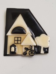Tricycle in yard – black & tan – House Pins by Lucinda