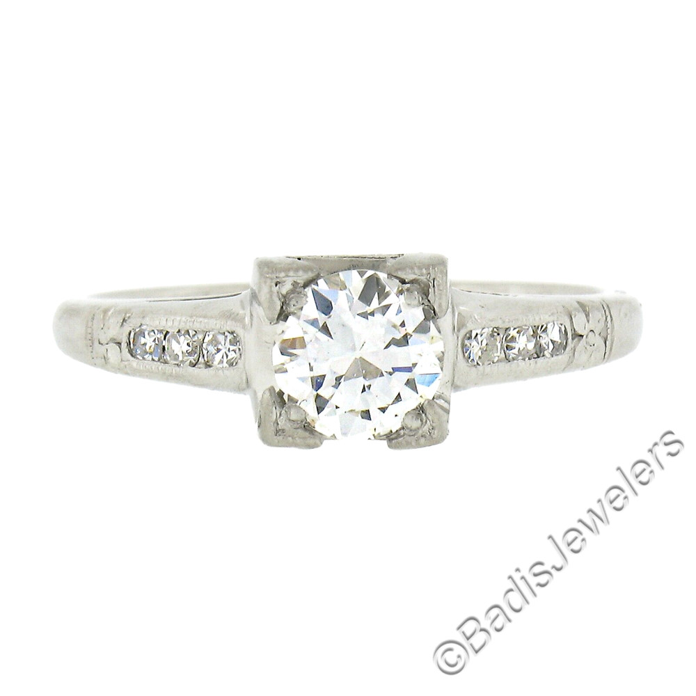 Antique Platinum 0.60ctw Old European Cut Diamond Floral Work Engagement Ring