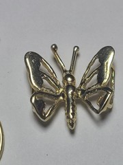 5.50 14K SOLID YELLOW GOLD, 6 14K Charms and one heavy charm holder