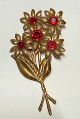 Vintage flower brooch gold tone C Clasp stamped brass red stones prong set