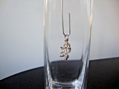 VTG 1970-80s SMALL 3D FLOWER W/ DIAMOND CUTS STERLING SILVER STAMPED 925 PENDANT