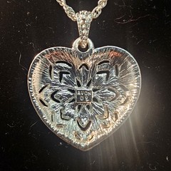 Vintage Sparkling Silver Toned Avon heart pendant with rhinestones