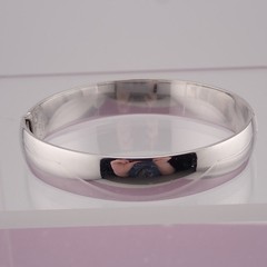 Vintage Shiny Monet Silver Tone 6 1/2″ Hinged Tension 10mm Bangle Bracelet