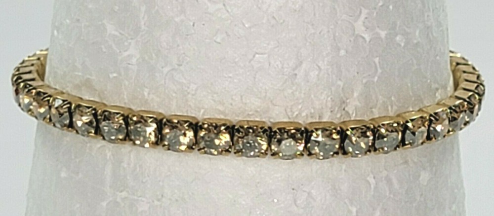 Prong Set Clear Rhinestones Gold Tone Stretch Tennis Bracelet 7.-8.5 In 4mm Wide